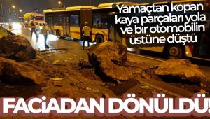 İzmir’de yamaçtan kopan kaya parçaları yola ve bir otomobilin üstüne düştü